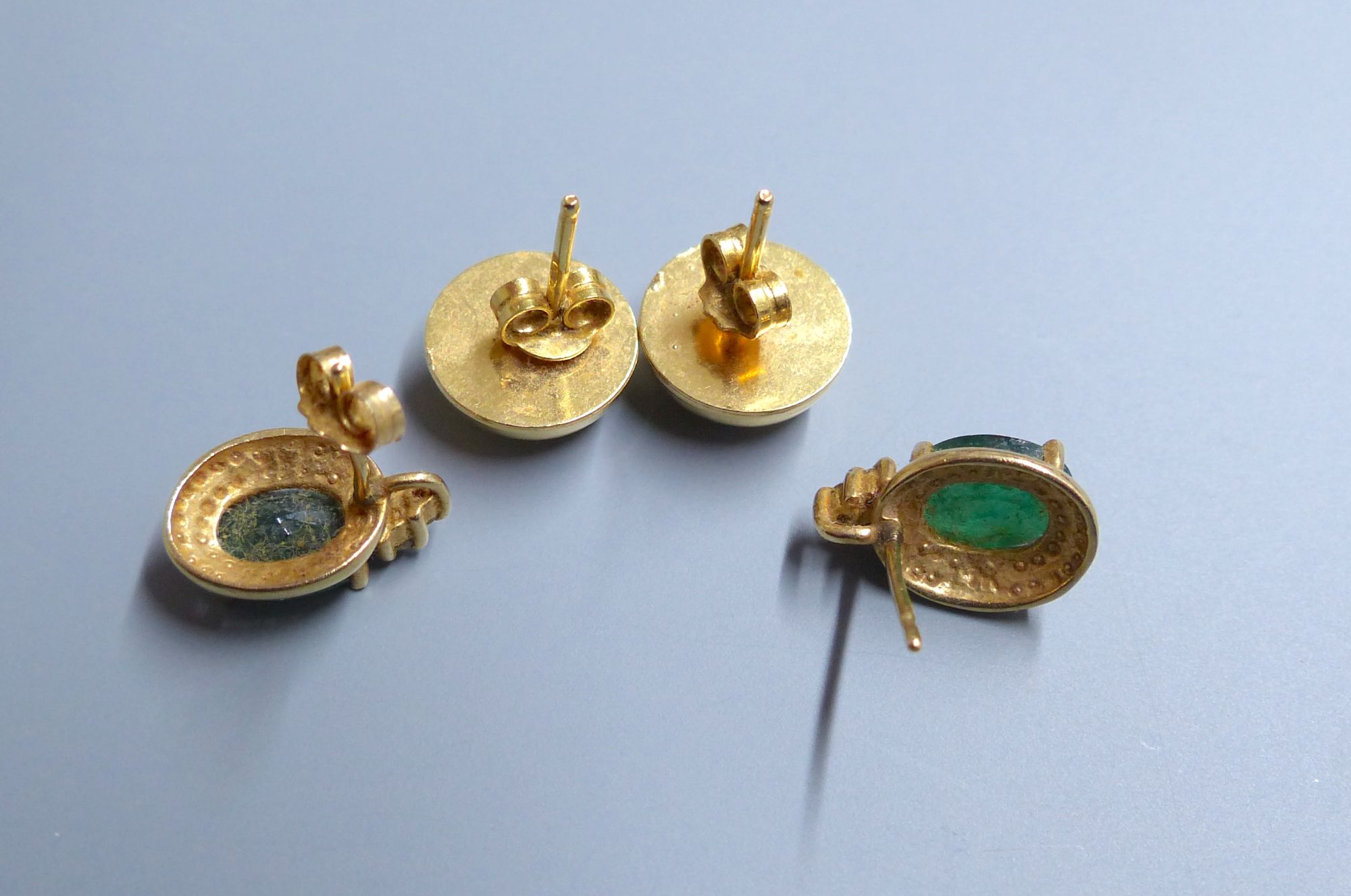Two modern pairs of earrings.